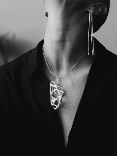 Silver pendant and earrings